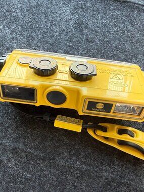 Vintage Minolta Weathermatic Camera Yellow